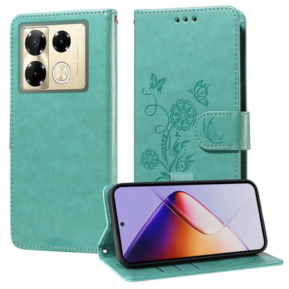 Teal leather phone case with embossed butterfly and flower design, flip cover