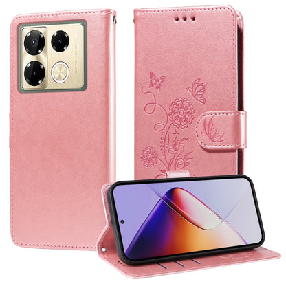 Pink leather phone case with embossed butterfly and flower design, flip cover
