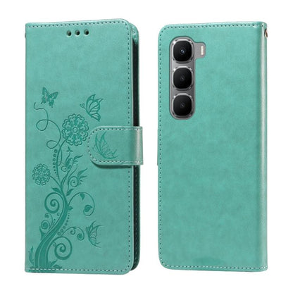 Teal leather folio phone case with embossed butterfly and floral design, front flap