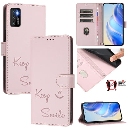 RFID leather wallet phone case in pale pink with “Keep Smile” script and card slots