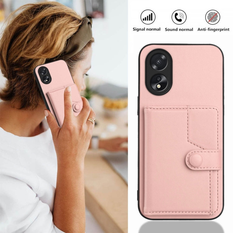 Pink phone wallet case with card pocket and button strap, shown from back