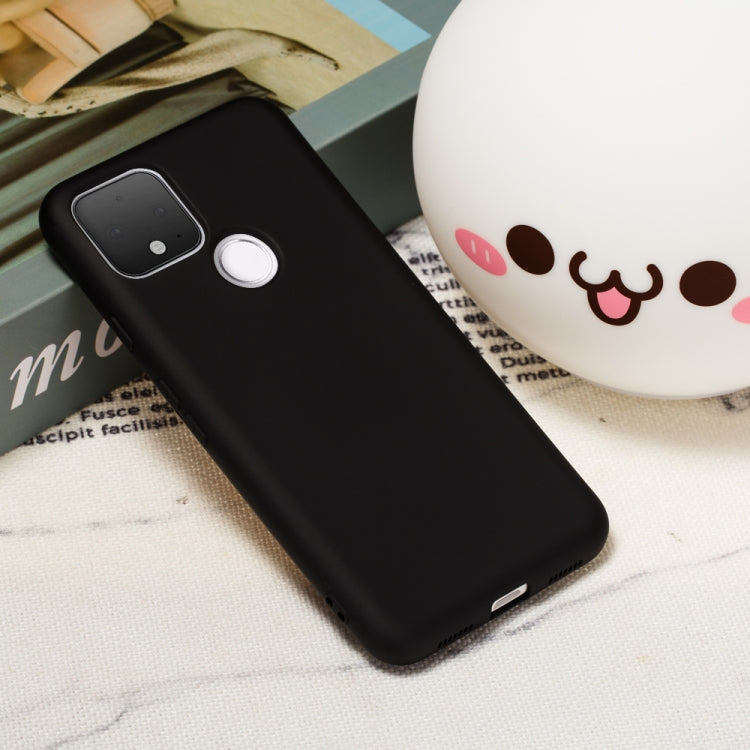 Black full-coverage silicone phone case covering the back and edges with camera cutout