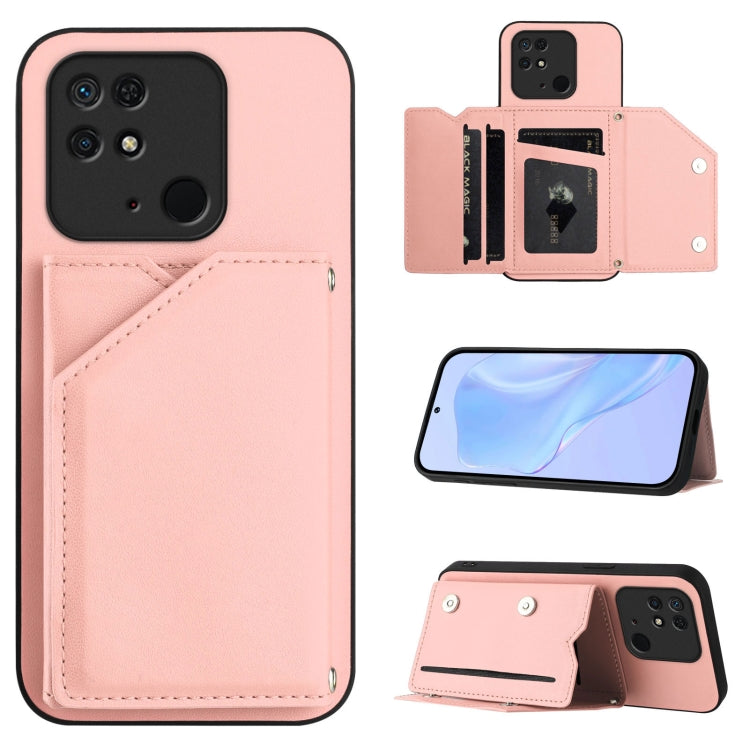 Pink leather-look phone case with four card slots and wrist strap