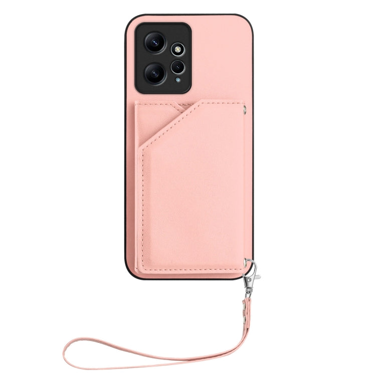 Pink leather-style phone case with wrist strap, front camera cutouts, and card holder panel