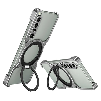 Silver robotic arm MagSafe phone case with black holder ring and camera cutouts
