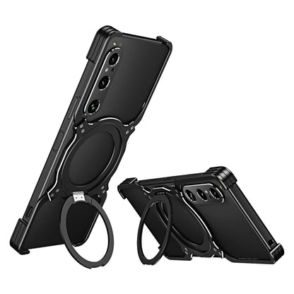 Black robotic arm MagSafe phone case with silver accents and circular holder ring