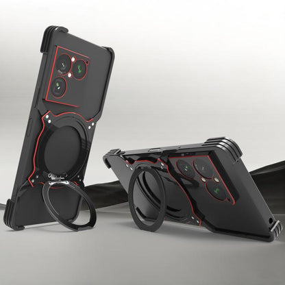 Black metal MagSafe phone case with mechanical arm stand and red accent trim