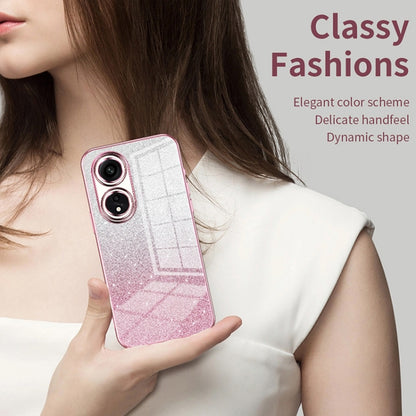 Pink glitter phone case with electroplated trim and dual camera cutouts.