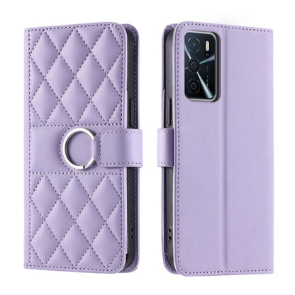 Purple rhombic quilted leather phone case with ring strap; front and back view