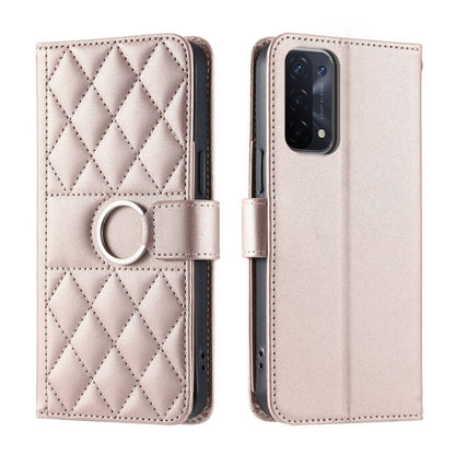 Light pink rhombic quilted leather phone case with ring strap; front and back view
