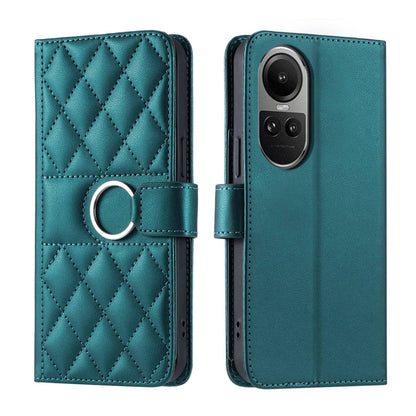 Teal quilted rhombic leather phone case with ring buckle strap.