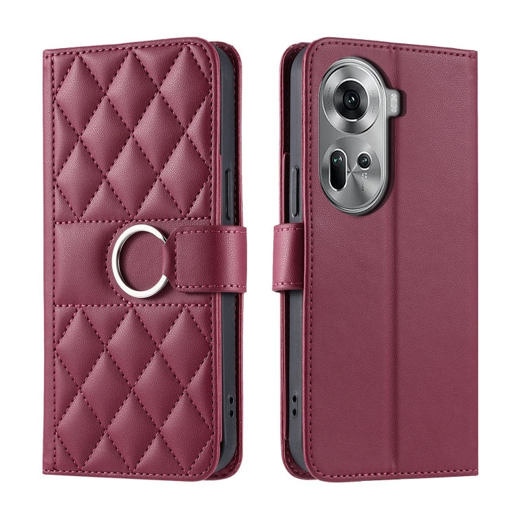Burgundy rhombic quilt leather phone case with wrist strap and ring holder, folio