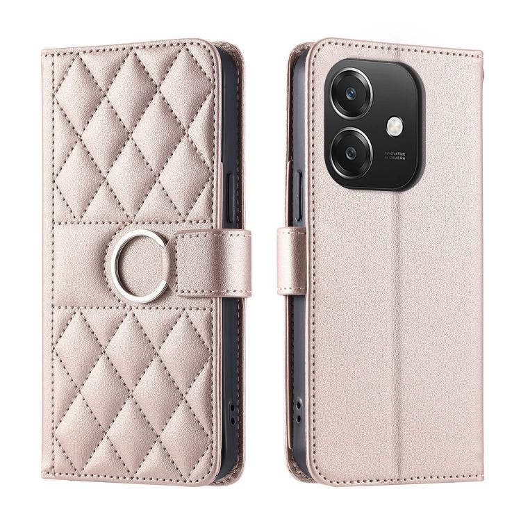Light pink leather wallet phone case with diamond quilt and ring buckle strap.