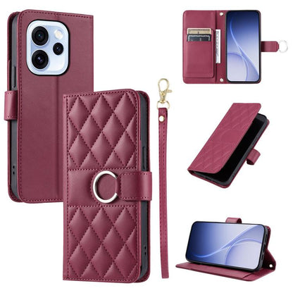 Burgundy leather phone case with rhombus quilt, ring buckle, and wrist strap