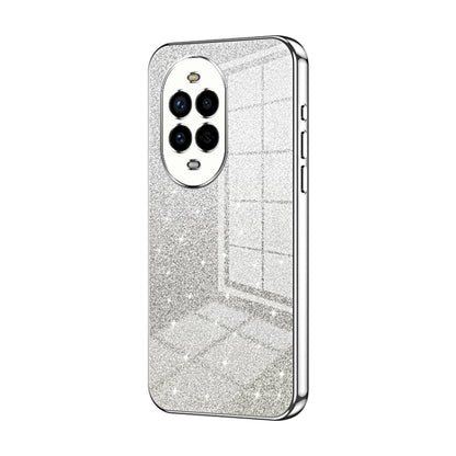 Silver glitter phone case with transparent back and dual camera cutouts, chrome edges
