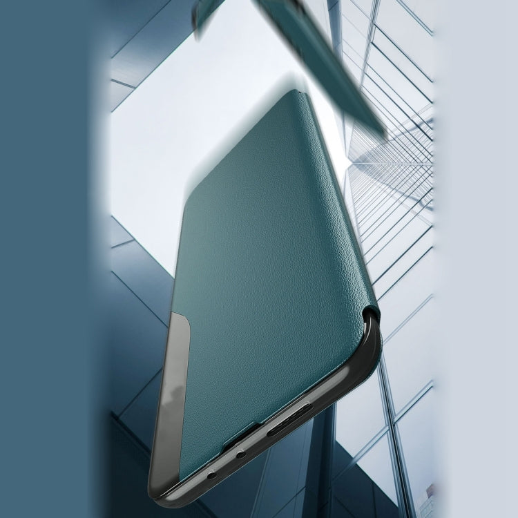 Teal leather flip phone case with foldable stand and magnetic closure, angled view.