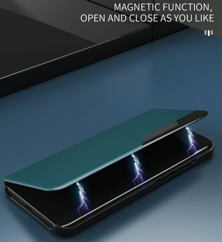 Teal leather flip phone case with magnetic closure, protects phone front.