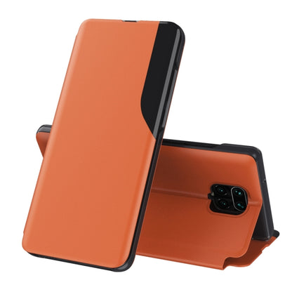 Orange leather flip phone case with foldable stand and magnetic closure.