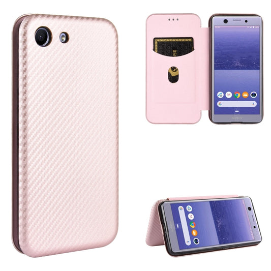 Pink magnetic flip phone case with carbon-fiber texture, card slot, kickstand view