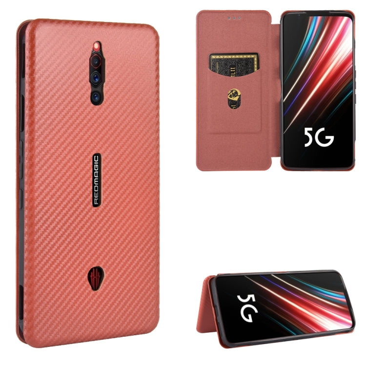 Carbon fiber texture magnetic flip phone case with card slot, pink/red.