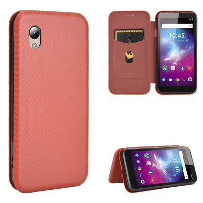 Carbon fiber texture magnetic flip phone case with card slot, coral pink, kickstand view.