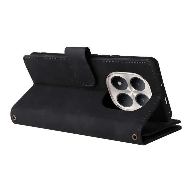Black leather flip phone wallet case with folio stand and camera cutout.
