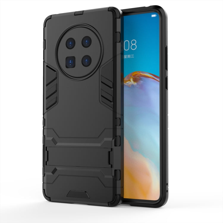 Black shockproof protective phone case with cutouts and screen-protecting edges