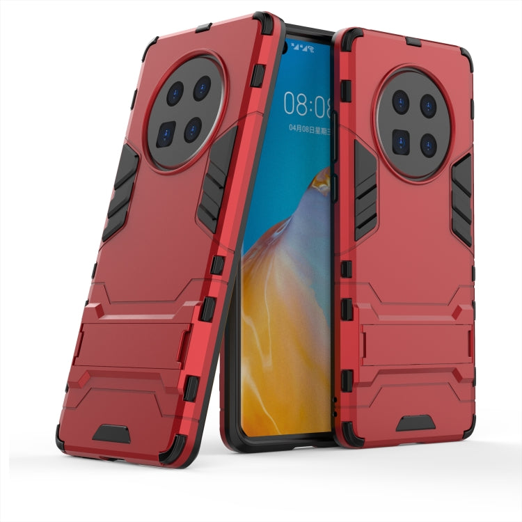 Red shockproof phone case with dual-layer grip and raised camera protection