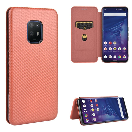 Magnetic flip phone case with card slot, carbon-fiber texture, pink/brown color.
