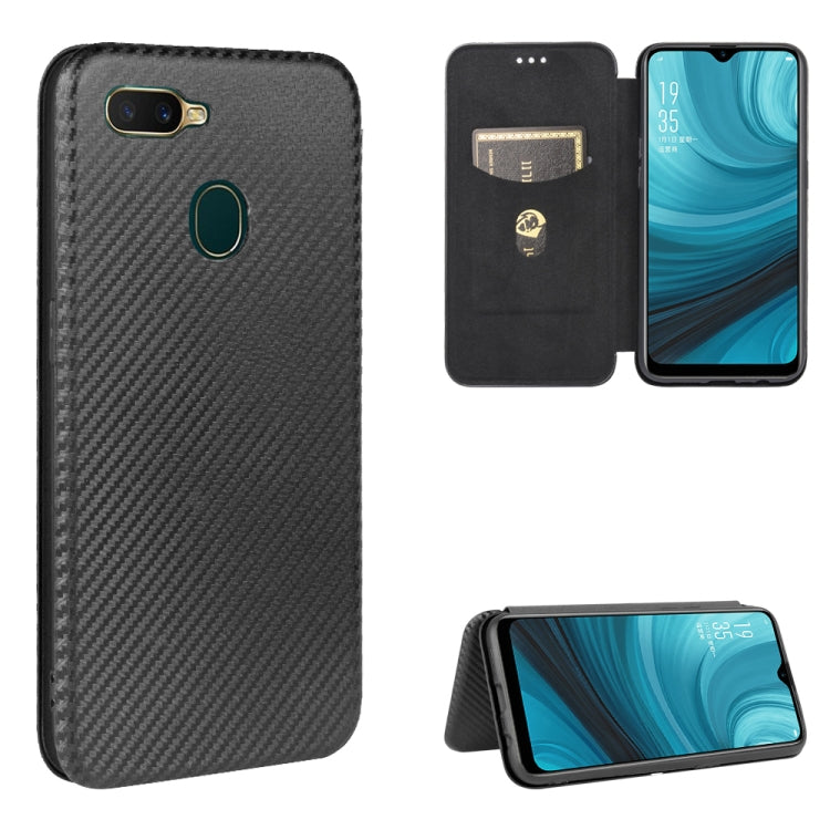 Black carbon-fiber texture magnetic flip phone case with card slot, stand view