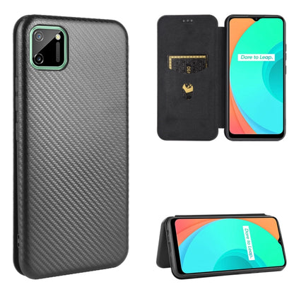 Dark charcoal carbon fiber textured magnetic flip phone case with card slot and stand view