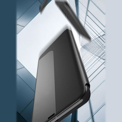 Gray leather-style flip phone case with textured finish and camera cutout