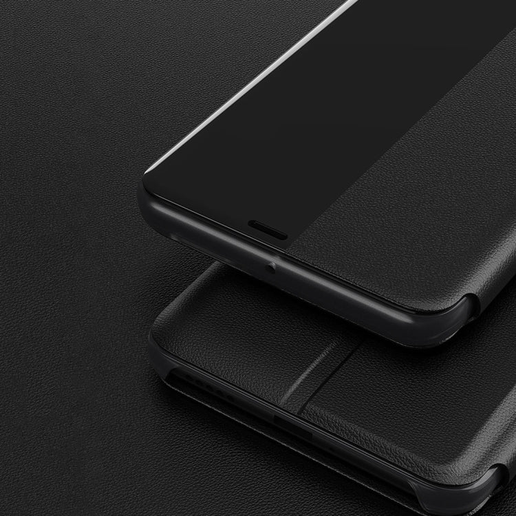 Black phone case with flip cover and precise cutouts on the bottom edge