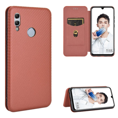 Pink magnetic flip phone case with carbon fiber back, card slot, and viewing window
