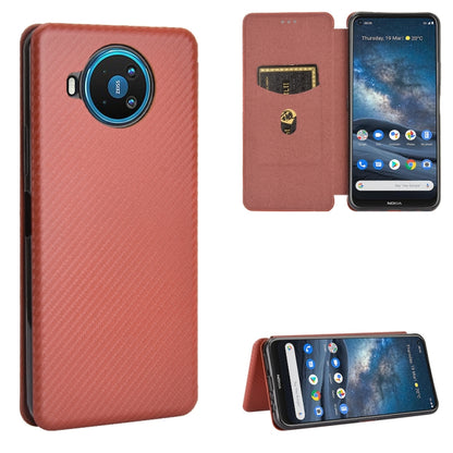 Brown carbon fiber textured magnetic flip case with card slot and kickstand