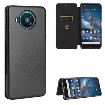 Dark gray carbon fiber textured magnetic flip case with card slot and viewing stand