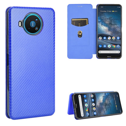 Blue magnetic flip phone case with carbon-fiber texture and card slot