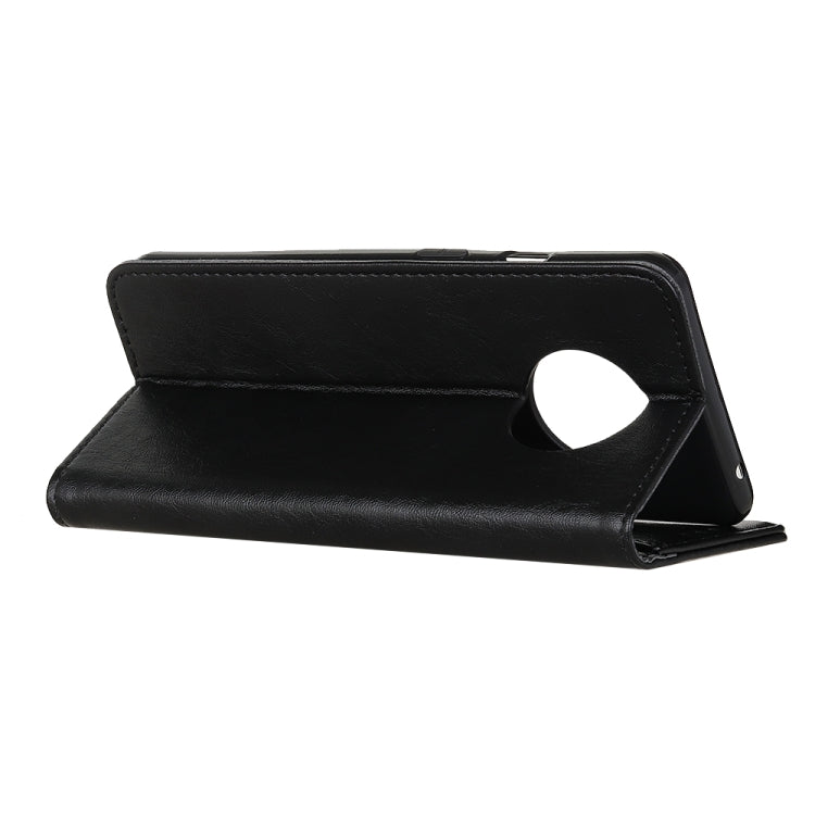 Black leather flip phone case with kickstand and circular cutout