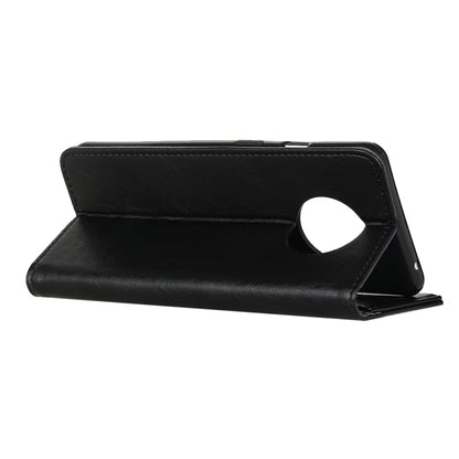 Black leather flip phone case with kickstand and circular cutout