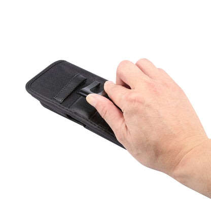 Black phone waist pack front pocket with magnetic-style closure, hand shown