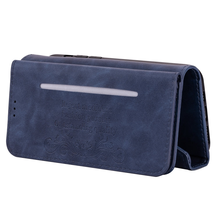 Blue leather wallet-style phone case with embossed pattern on front flap
