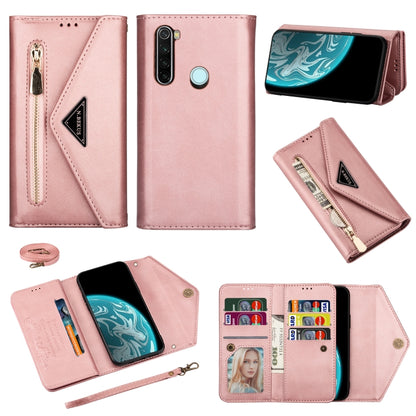 Rose pink leather flip phone case with zipper and card slots, plus phone holder.