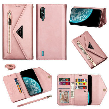Pink leather phone wallet case with zipper, card slots, photo window, and lanyard strap
