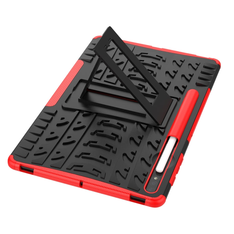 Rugged black tablet case with red edges, kickstand panel, and side handle