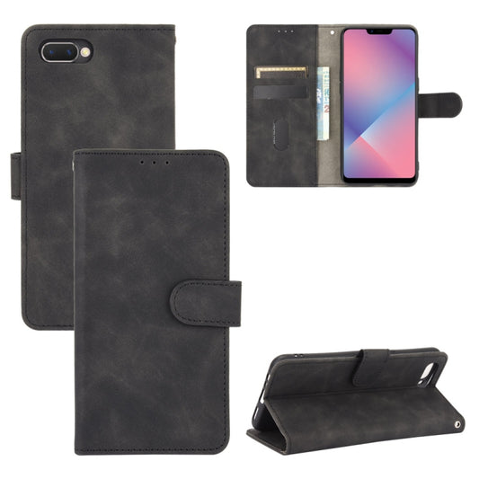 Black PU leather flip phone case with magnetic closure, card slots, and wallet pocket
