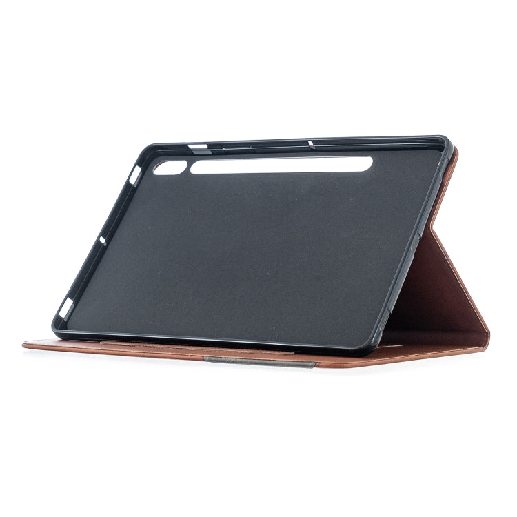 Brown leather folio case with diamond pattern, tablet propped in stand view