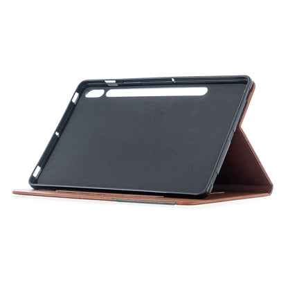 Brown leather folio case with diamond pattern, tablet propped in stand view