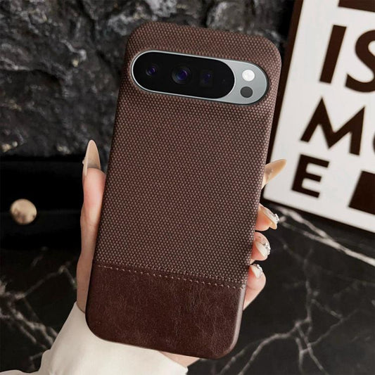 Two-tone fabric phone case in dark brown with stitched bottom panel and camera cutout