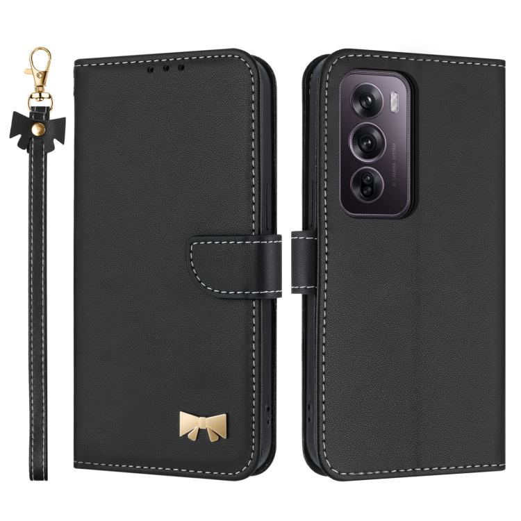 Black leather phone case with hand strap, bow charm, and card-slot flap cover