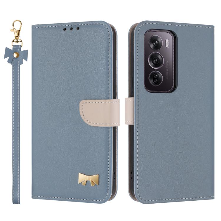 Light blue leather phone case with hand strap, bow charm, and card-slot flap cover